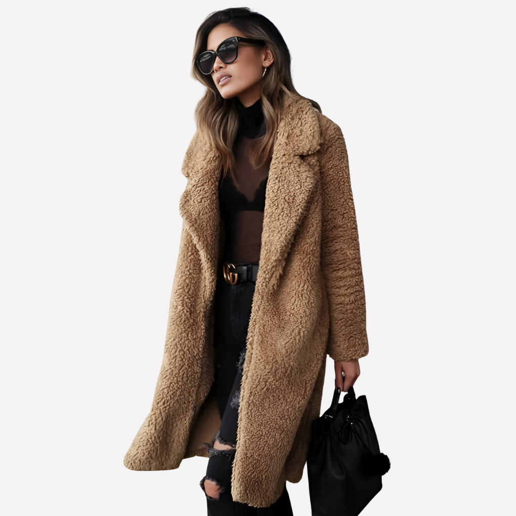 Comfortabele lange teddyjas voor dames. Trendy oversized winterjas, deze warme outwear combineert mode met comfort.