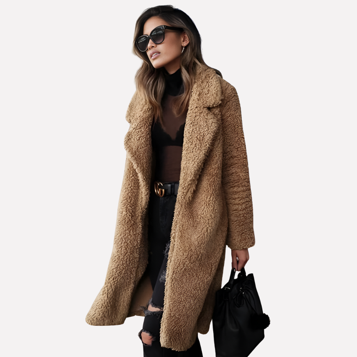 Comfortabele lange teddyjas voor dames. Trendy oversized winterjas, deze warme outwear combineert mode met comfort.