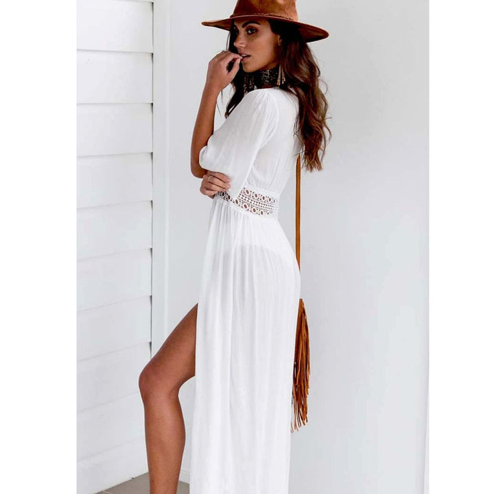 Elegant Elara strandjurk met fijne kantafwerking en verstelbare striksluiting, ideaal als kaftan.