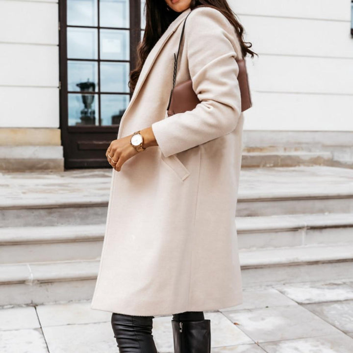 Luxe lange kasjmier winterjas voor dames, biedt superieure warmte en stijl. Ideale outerwear.
