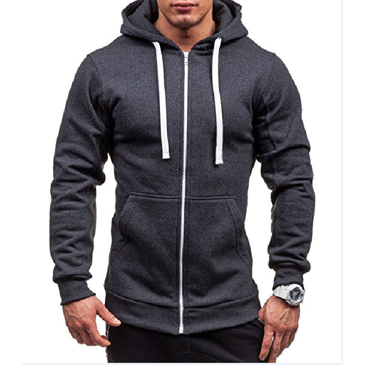 Man draagt een donkergrijze winddichte fleece heren hoodie met rits