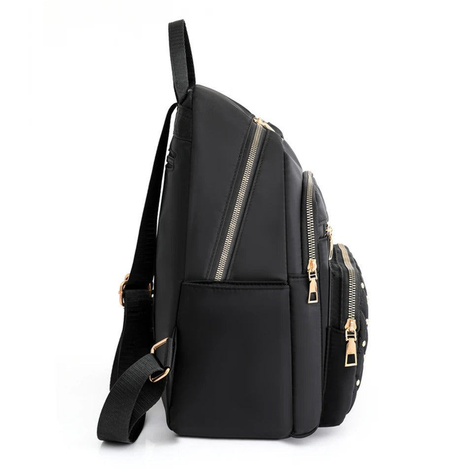 Praktische waterdichte nylon dames rugzak; ideaal als schooltas, reistas of dagelijkse tas.