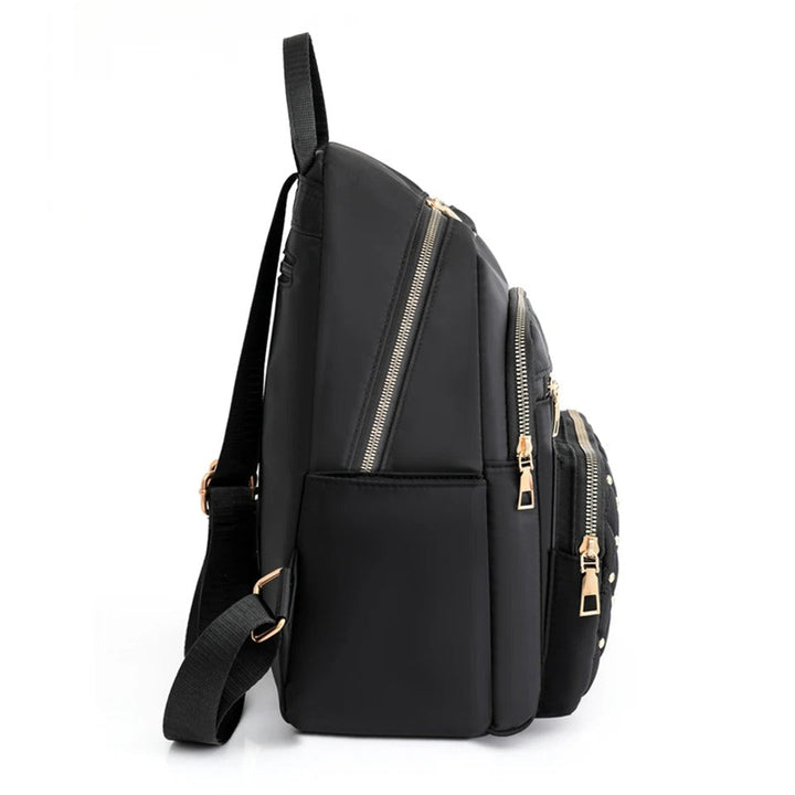 Praktische waterdichte nylon dames rugzak; ideaal als schooltas, reistas of dagelijkse tas.