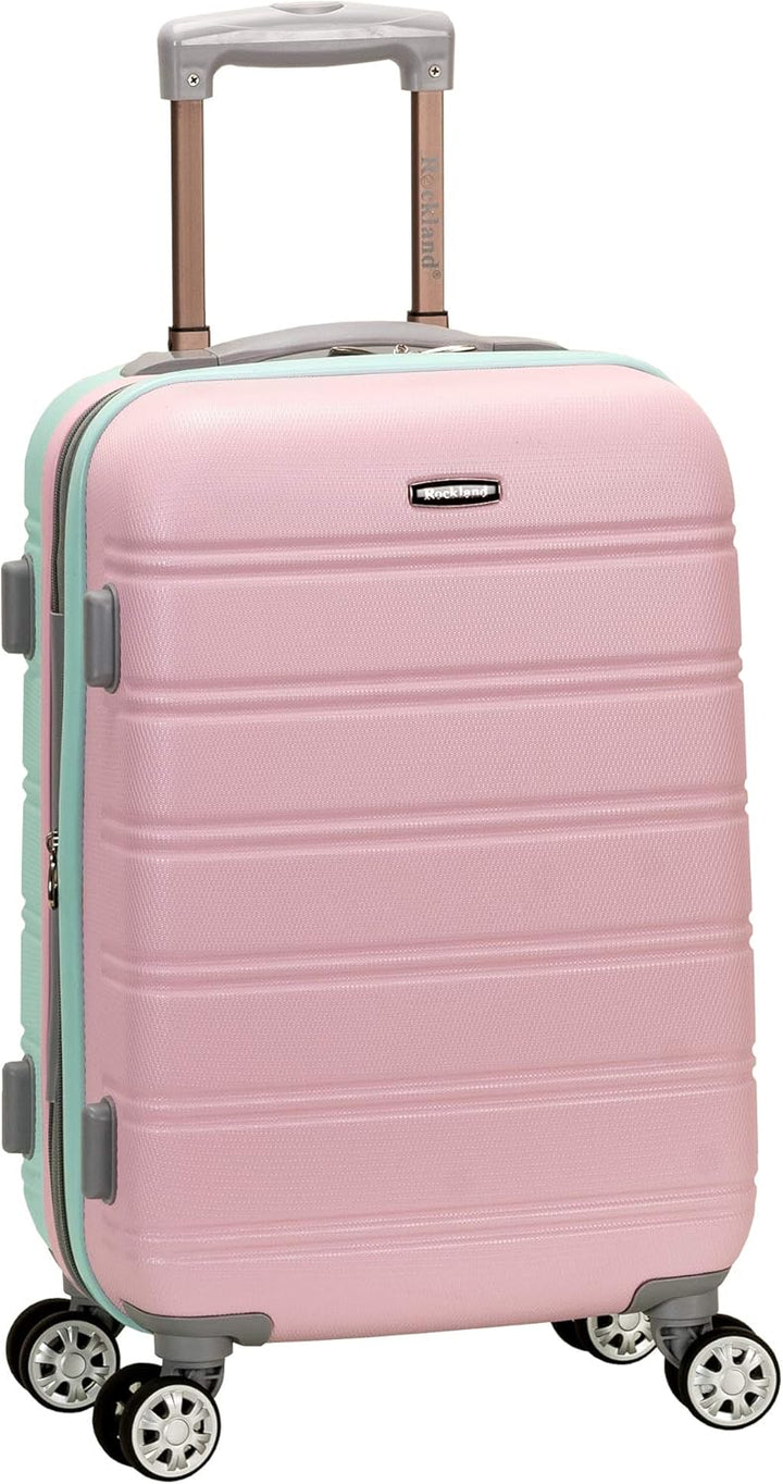 Lichtroze lichtgewicht handbagage koffer met dubbele spinner wielen, ideaal voor reizen.