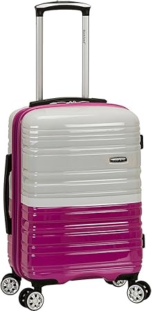 Moderne lichtroze hardcase handbagage, uitbreidbaar en met dubbele spinnerwielen voor moeiteloos reizen.