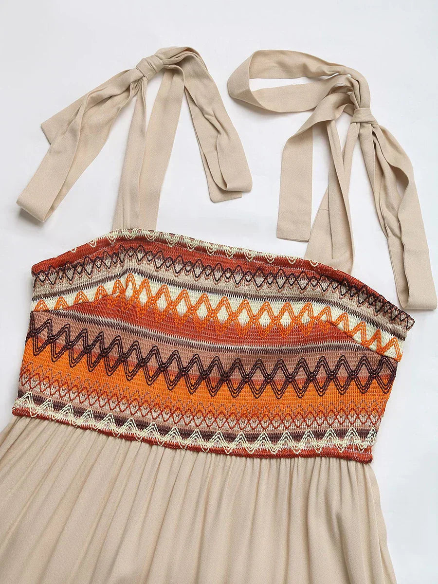 Stijlvolle beige midi jurk met spaghettibandjes voor dames, een luchtige zomerjurk met casual elegantie.