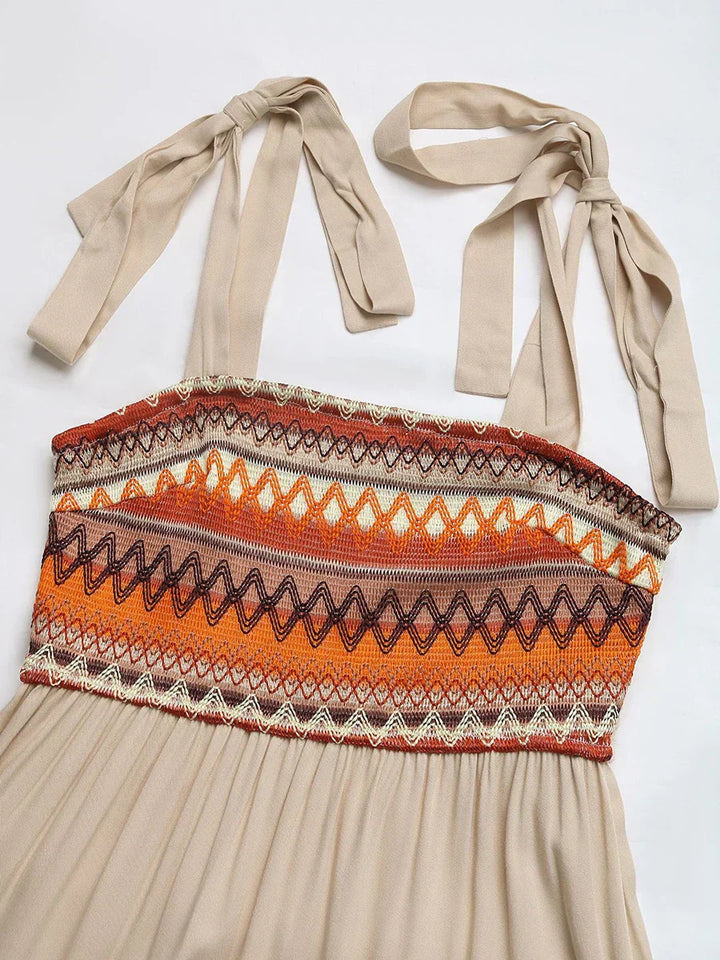 Stijlvolle beige midi jurk met spaghettibandjes voor dames, een luchtige zomerjurk met casual elegantie.