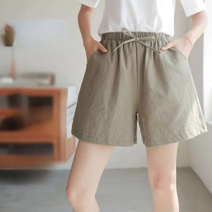 Luchtige dames linnen shorts met hoge taille, sportief en comfortabel voor de zomer.