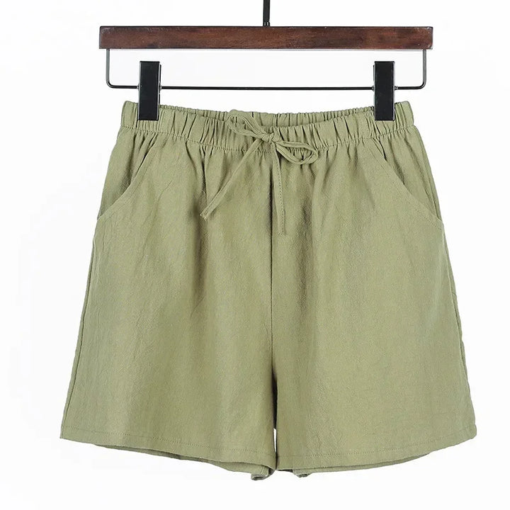 Veelzijdige dames linnen shorts met hoge taille, comfortabel voor strand of stad.