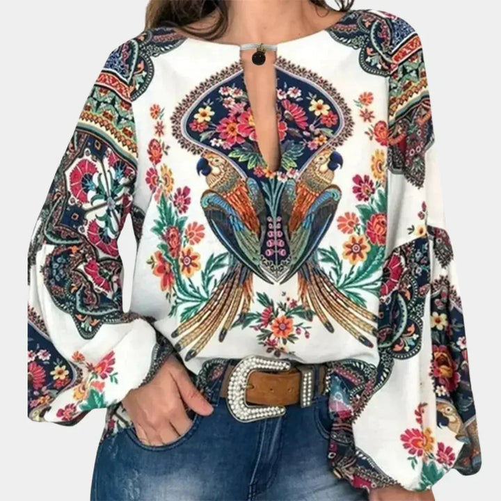 Luchtige dames zomerblouse met bloemenprint, ideaal voor comfortabele casual vrouwenmode.