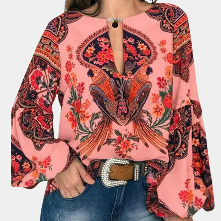 Comfortabele witte zomerblouse voor dames met frisse bloemenprint, ideaal voor casual lente/zomer outfits.