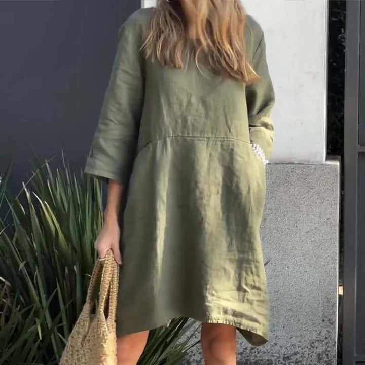 Dames Malia zomerjurk met losse pasvorm en zakken, ideaal voor een dagje strand of stadswandeling.