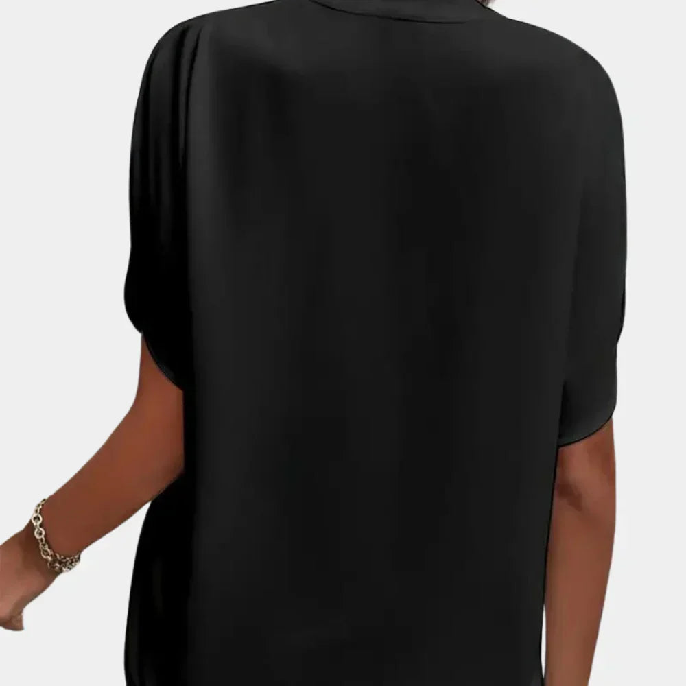 Comfortabele Ella zomertop voor dames; casual luchtige blouse met relaxte pasvorm, ideaal voor vakantie.