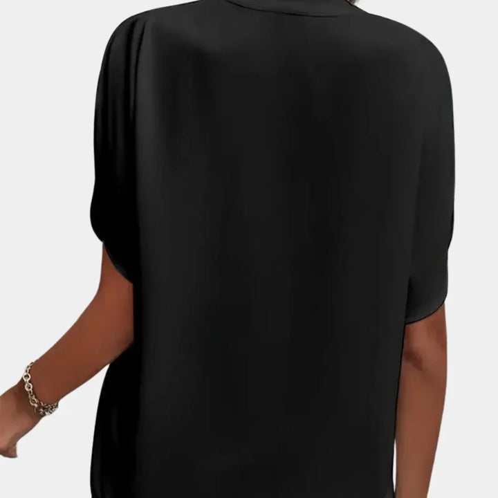 Comfortabele Ella zomertop voor dames; casual luchtige blouse met relaxte pasvorm, ideaal voor vakantie.