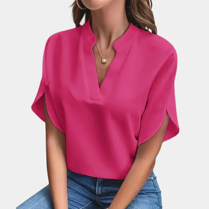 Elegante dames zomertop Ella, luchtige blouse met korte mouwen en ronde hals, perfect voor dagelijkse zomerstijl.