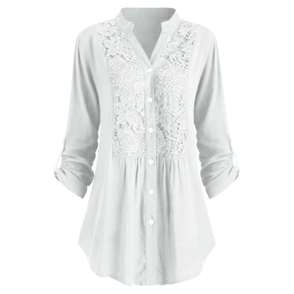 Luchtige damesblouse met pofmouwen, elegant voor zomerse gelegenheden.