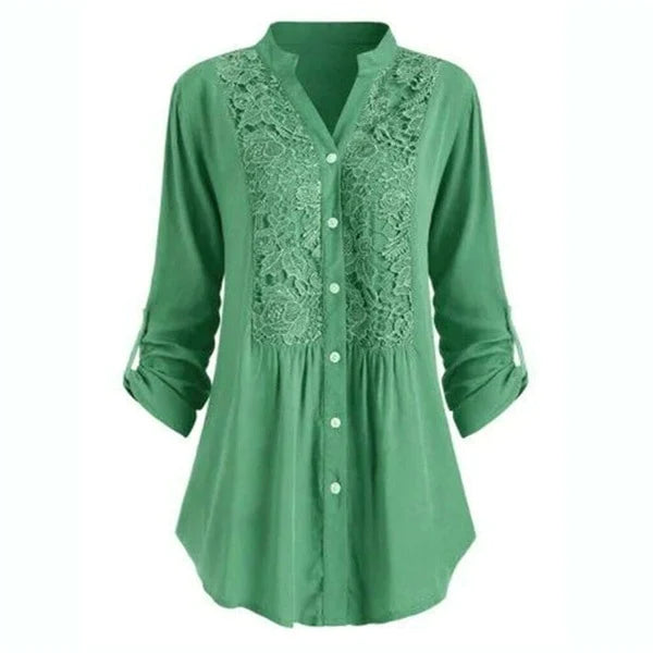 Luchtige damesblouse met pofmouwen, elegant voor zomerse gelegenheden.