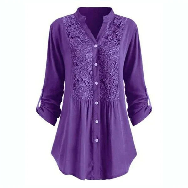 Luchtige damesblouse met pofmouwen, elegant voor zomerse gelegenheden.