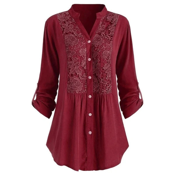 Luchtige damesblouse met pofmouwen, elegant voor zomerse gelegenheden.