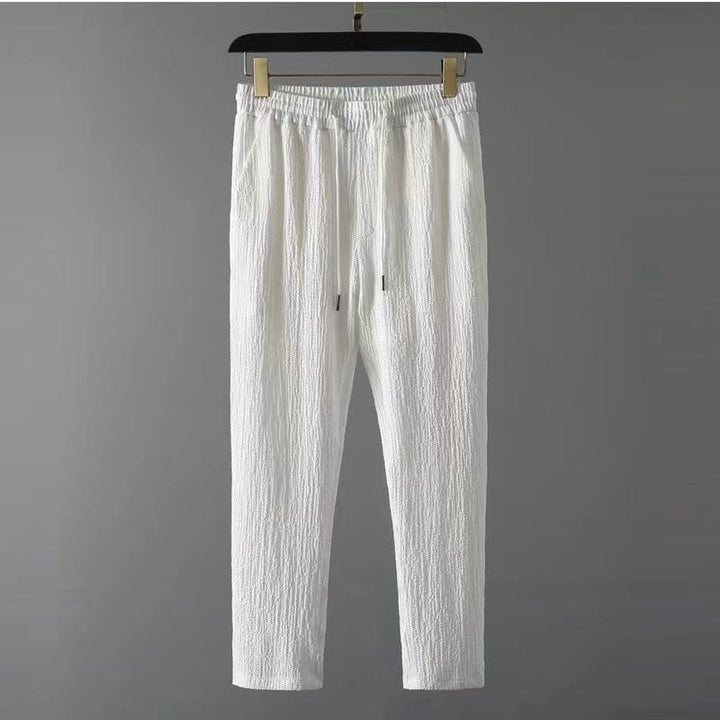 Zwarte Lyno herenset; casual zomerkleding voor mannen, ademende blouse en bijpassende broek.