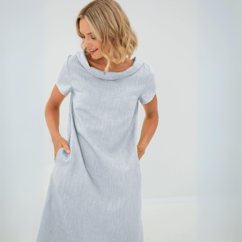 Dames linnen zomerjurk, midi lengte, mouwloos, perfect voor een stijlvolle en comfortabele zomer.