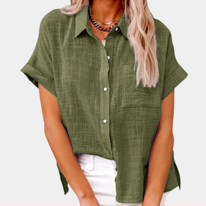 Elegante effen damesblouse met knoopsluiting en korte mouwen voor een zomerse look.