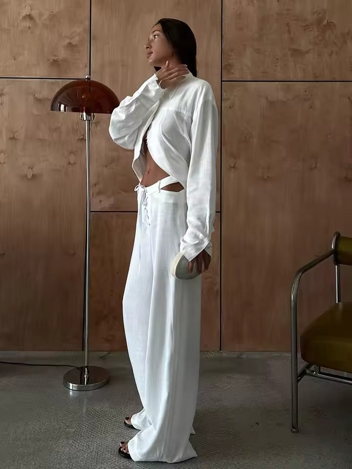 Stijlvolle zwarte Nayela tweedelige set voor dames, met losvallende longsleeve en broek. Veelzijdig en casual.