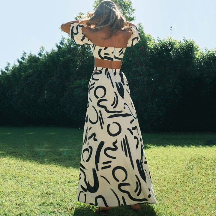 Comfortabele en stijlvolle dames boho set, bestaande uit crop top en midi rok, perfect voor lente- en zomeravonden.