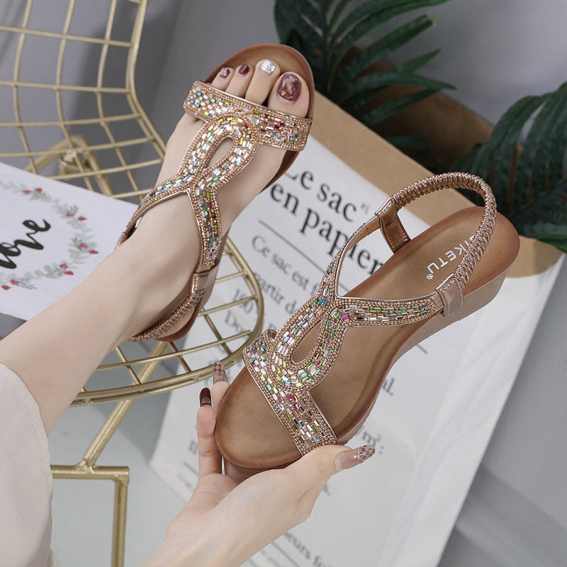 Zwarte luxe sandalen voor dames, met strass en een stijlvolle wedge hak.