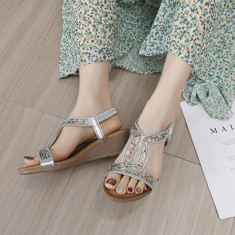 Luxe dames sandalen Celeste in zwart, met strass en een comfortabele wedge hak.