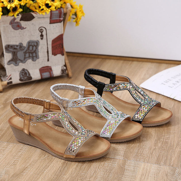 Feestelijke zwarte sandalen met strass en wedge hak, een must-have voor dames.