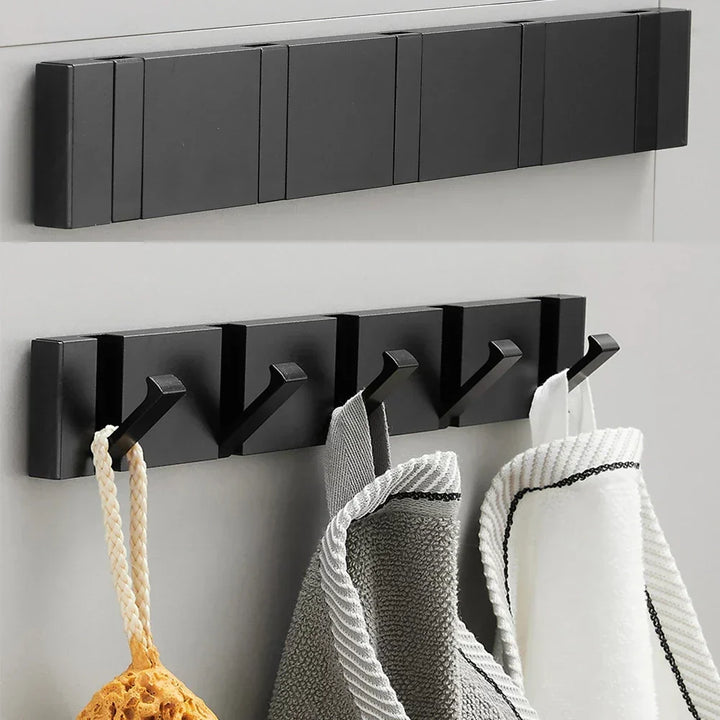 Design wandhaak, zwart en inklapbaar, voor een stijlvol en opgeruimd interieur in huis.