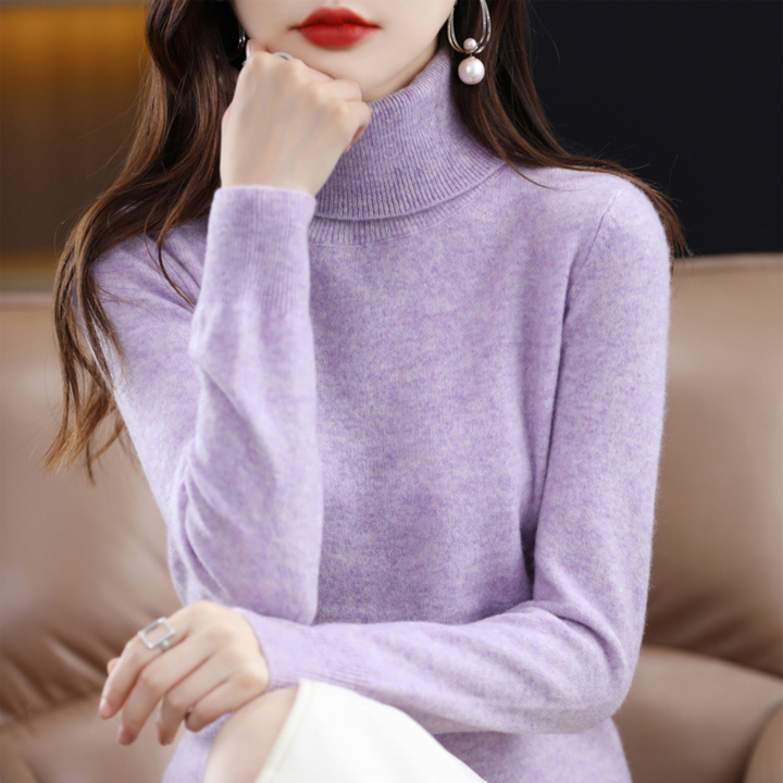 De Elena vrouwen trui: tijdloos design en luxe kasjmier comfort, ideaal voor uw herfstgarderobe.