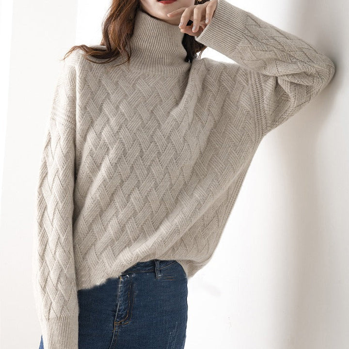 Luxe kasjmier trui dames, zacht en elegant, geschikt voor casual en formele outfits, in een warme grijze tint.