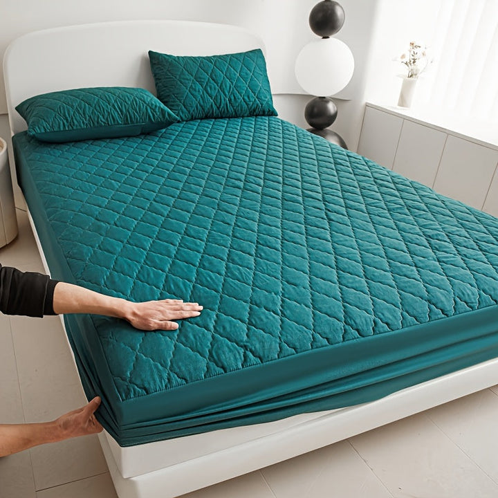 Luxe waterdichte matrasbeschermer, gewatteerd voor ademend slaapcomfort en optimale hygiëne.