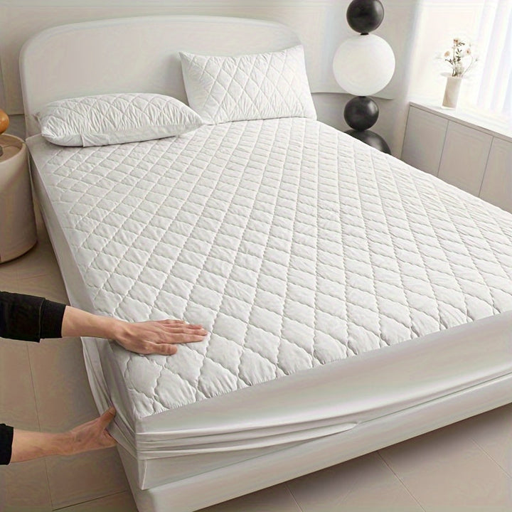Witte, gewatteerde matrasbeschermer, waterdicht en ademend, voor uw matras en beddengoed.