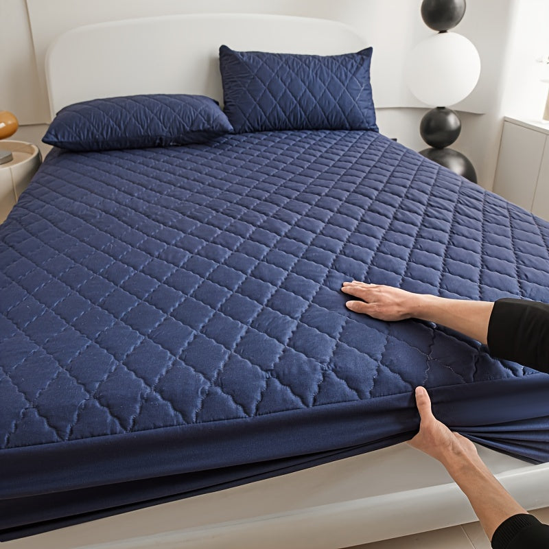 Hoogwaardige waterdichte matrasbeschermer, gewatteerd voor luxe comfort en ademende hygiëne.