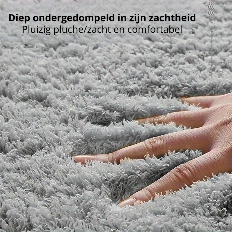 Zachte badmat van hoge kwaliteit, antislip en decoratief voor een warme badkamer.