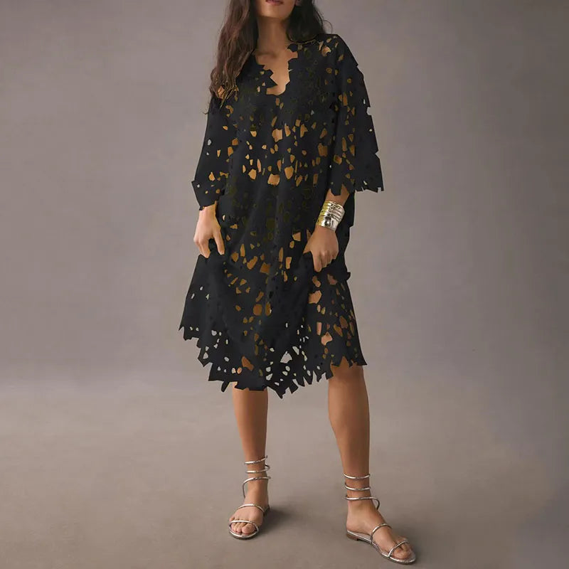 Maelis dames lente midi jurk met levendige bloemenprint en modieuze oogjesveter. Comfortabele en trendy zomerkleding.