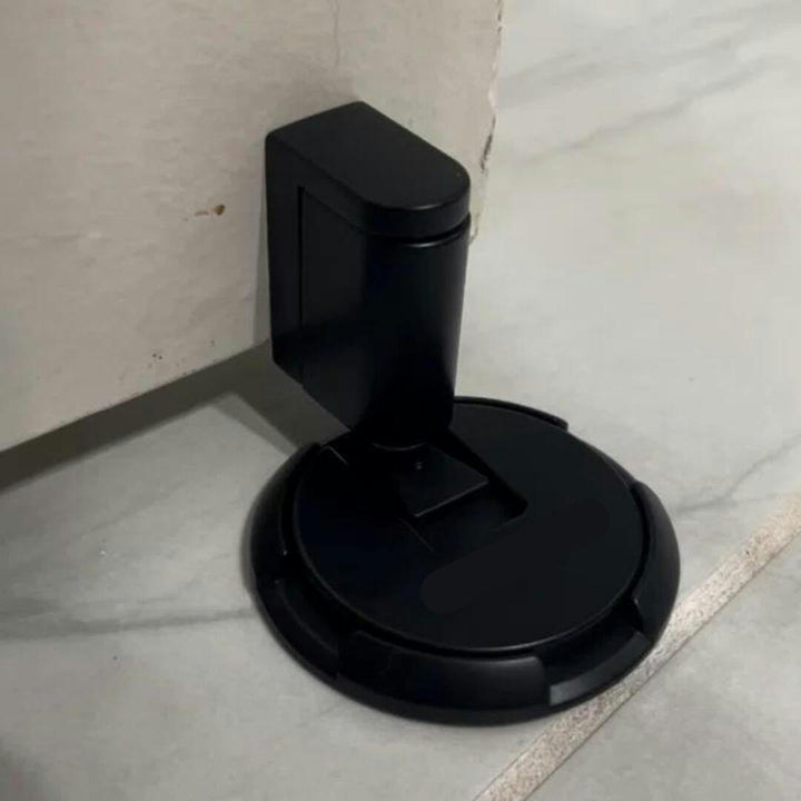 Boorvrije magnetische deurstopper die de deur stevig openhoudt. Gemakkelijk te installeren voor deurbescherming.