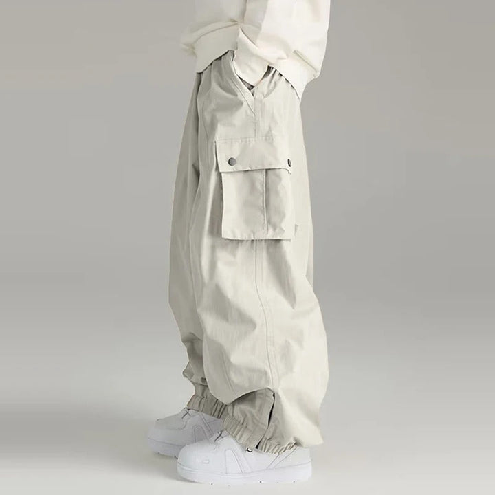 Stijlvolle zwarte unisex baggy skibroek, comfortabel voor skiën of snowboarden, perfecte wintersport kleding.