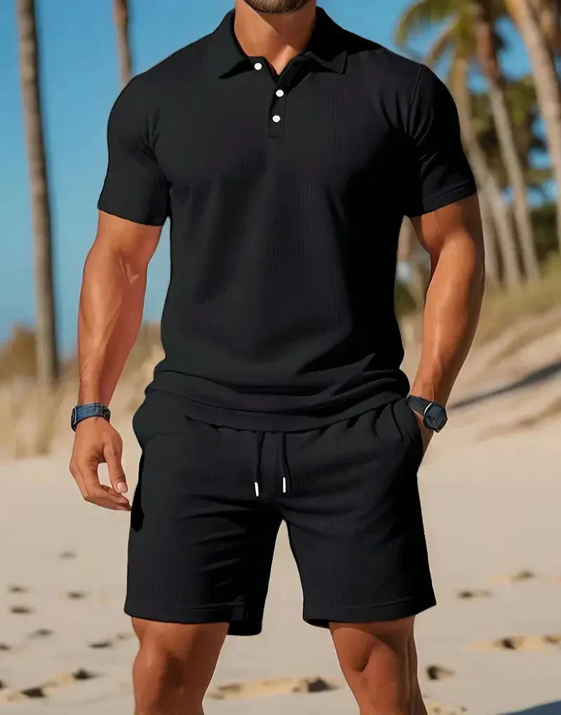 Stijlvolle heren ademende shorts van tweedelige set. Comfortabel voor zomerse dagen, perfect voor casual look.