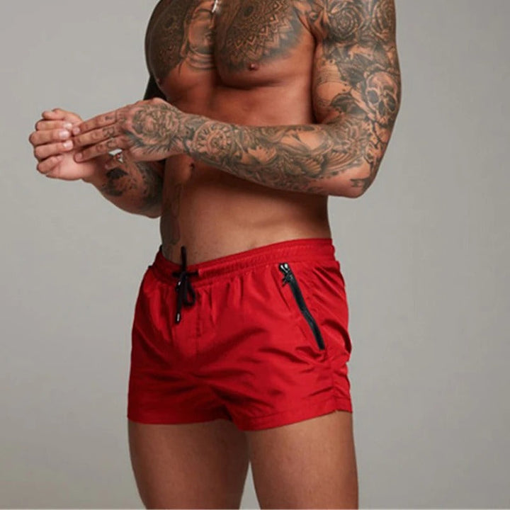 Veelzijdige mannen zwembroek, stretch en sneldrogend, geschikt voor zwemmen, strand en zomerse sporten.