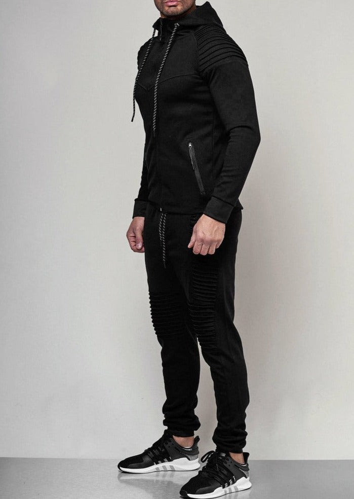 Trendy heren trainingspak met comfortabele pasvorm, inclusief modieuze hoodie en joggingbroek voor dagelijks gebruik.