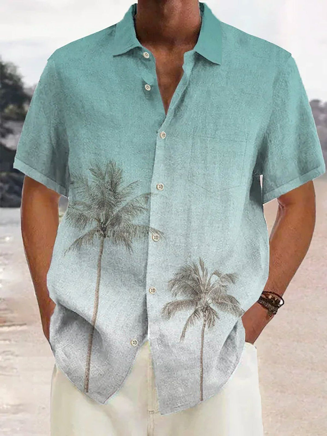 Mannen zomershirt Maceo met levendige tropische kokosboomprint en korte mouwen, ideaal voor strand en vakantie.