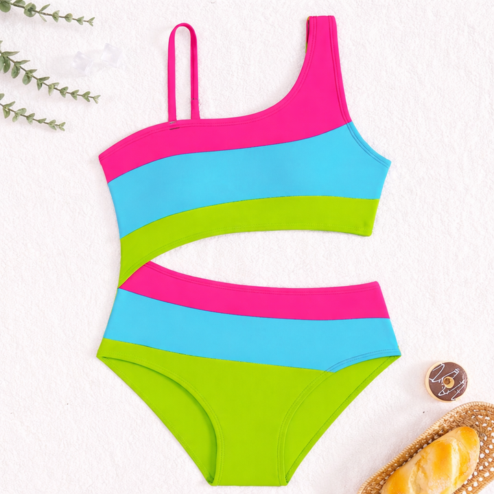 Asymmetrisch badpak voor meisjes met levendig kleurblok patroon en moderne taille uitholling. Trendy.