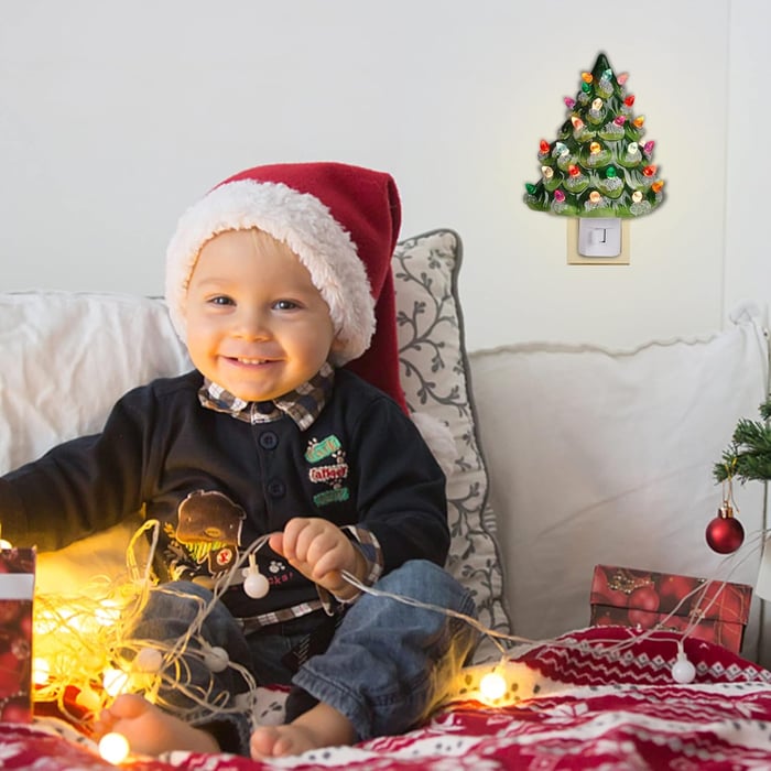 Breng magie in huis met dit MerryGlo kerstboom nachtlampje; sfeervolle LED kerstdecoratie.