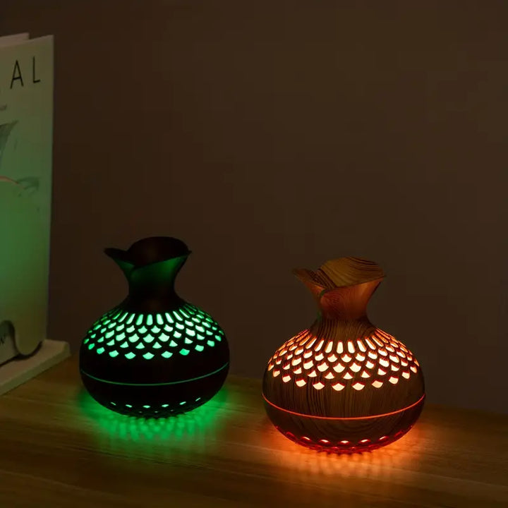 Compacte AromaBloom USB diffuser met sfeervol licht, voor welness en huisdecoratie.