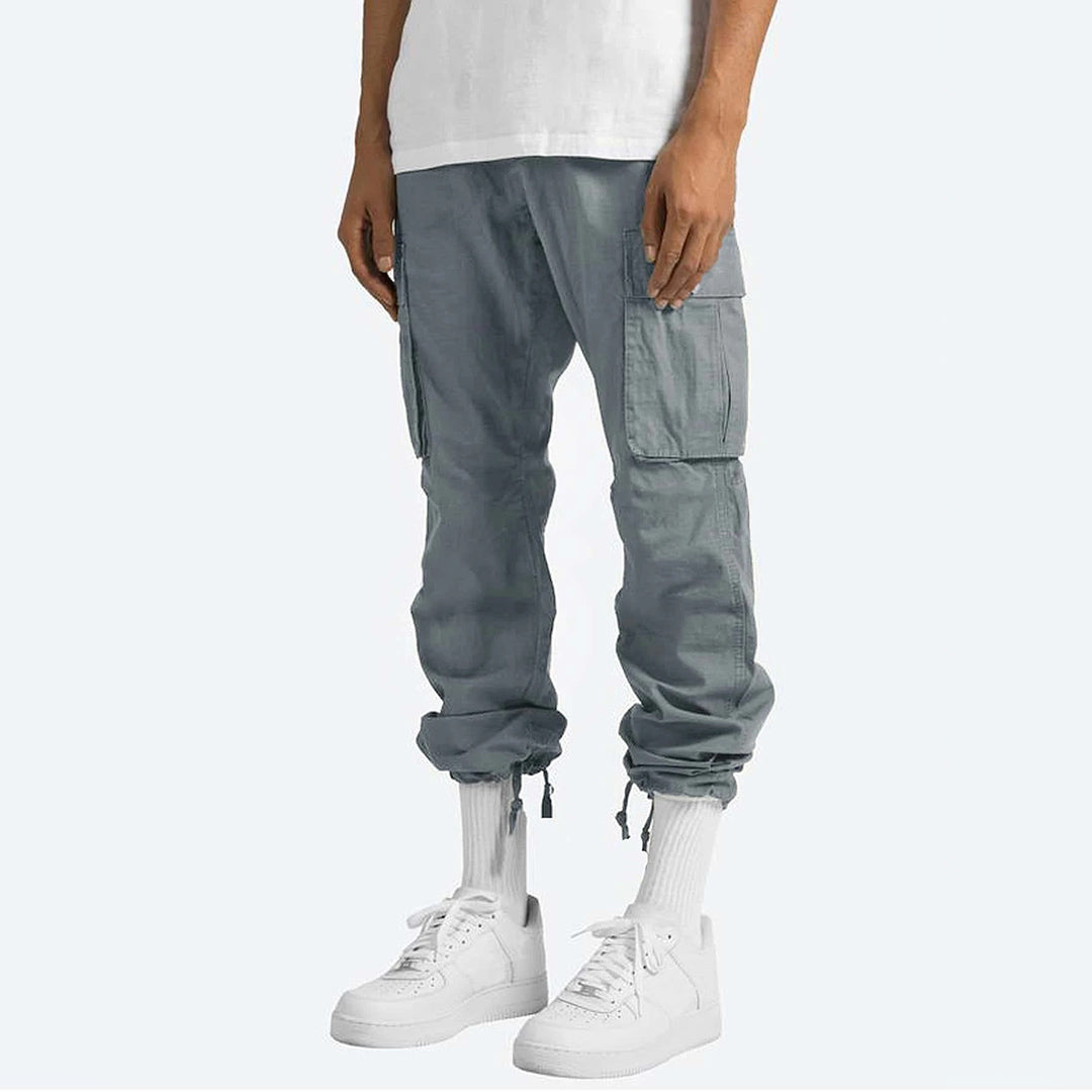 "Moderne heren cargo broek met cargozakken, comfortabele pasvorm, diverse kleuren, ideaal voor stijl en functionaliteit."