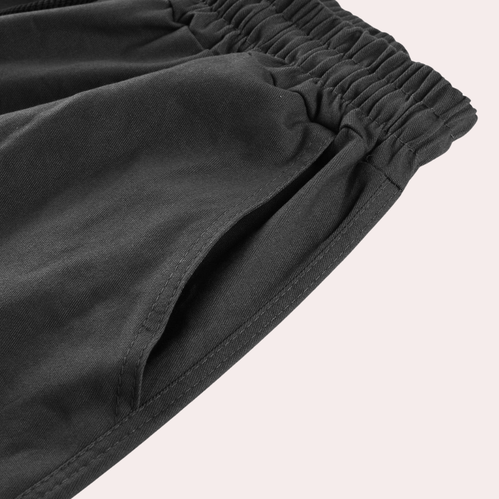 "Moderne heren cargo broek met cargozakken, comfortabele pasvorm, diverse kleuren, ideaal voor stijl en functionaliteit."